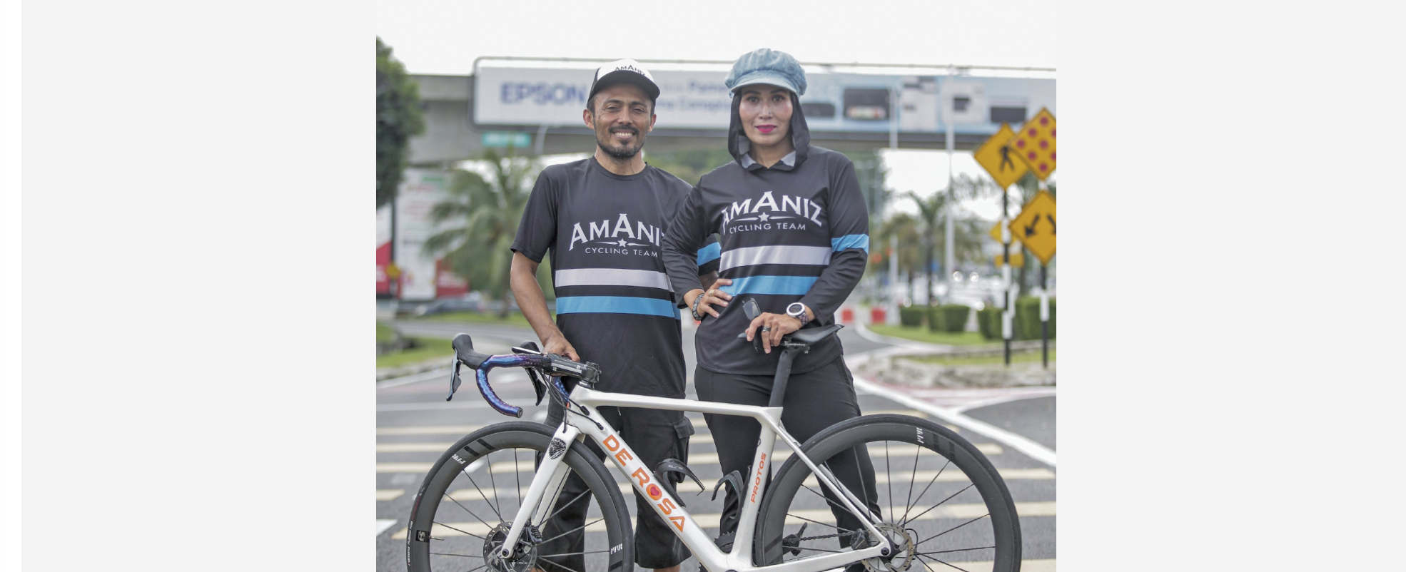 AmAniz Cycling Team riders with a De Rosa road bike